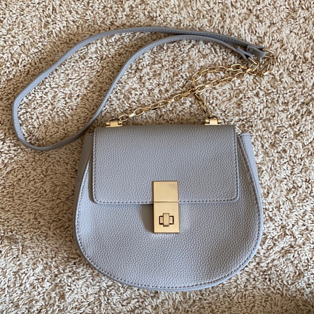 Grey express purse with gold latch